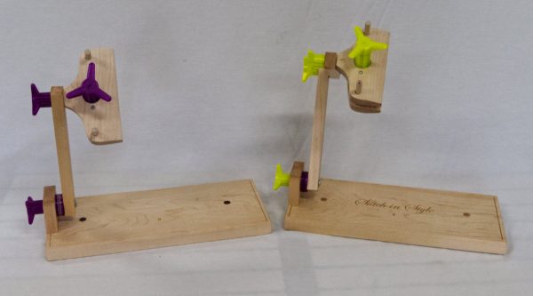 Single sided stand for holding stitching frames.