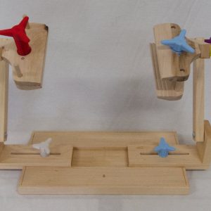 Two sided stand for holding stitching frames.